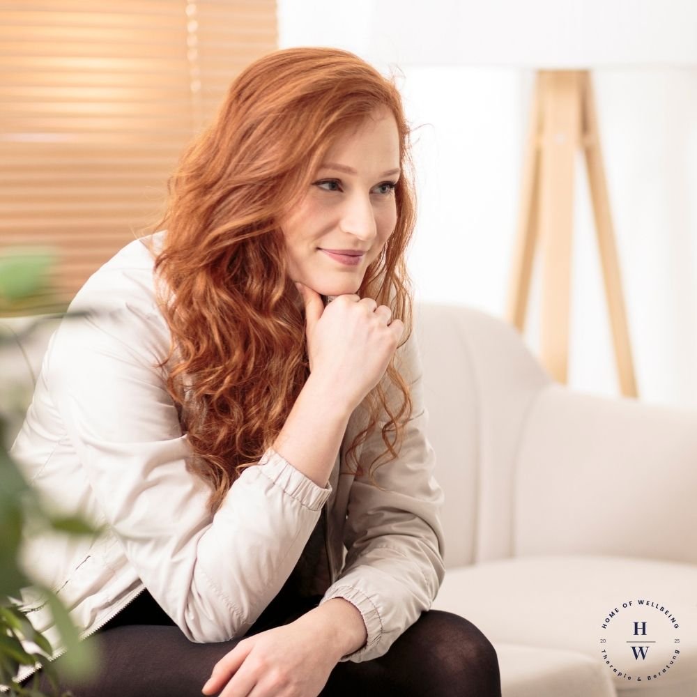 Bild zeigt eine Frau im Coachingsetting